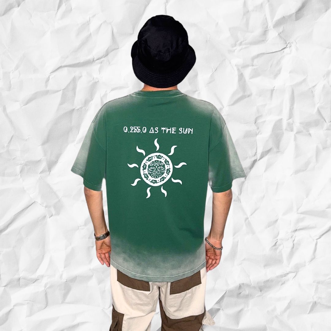 Back view of DALTONICO Hyperreal Sun Tee featuring the green RGB code “0.255.0 AS THE SUN” and symbolic brutalist sun print, worn with bucket hat and cargo trousers.